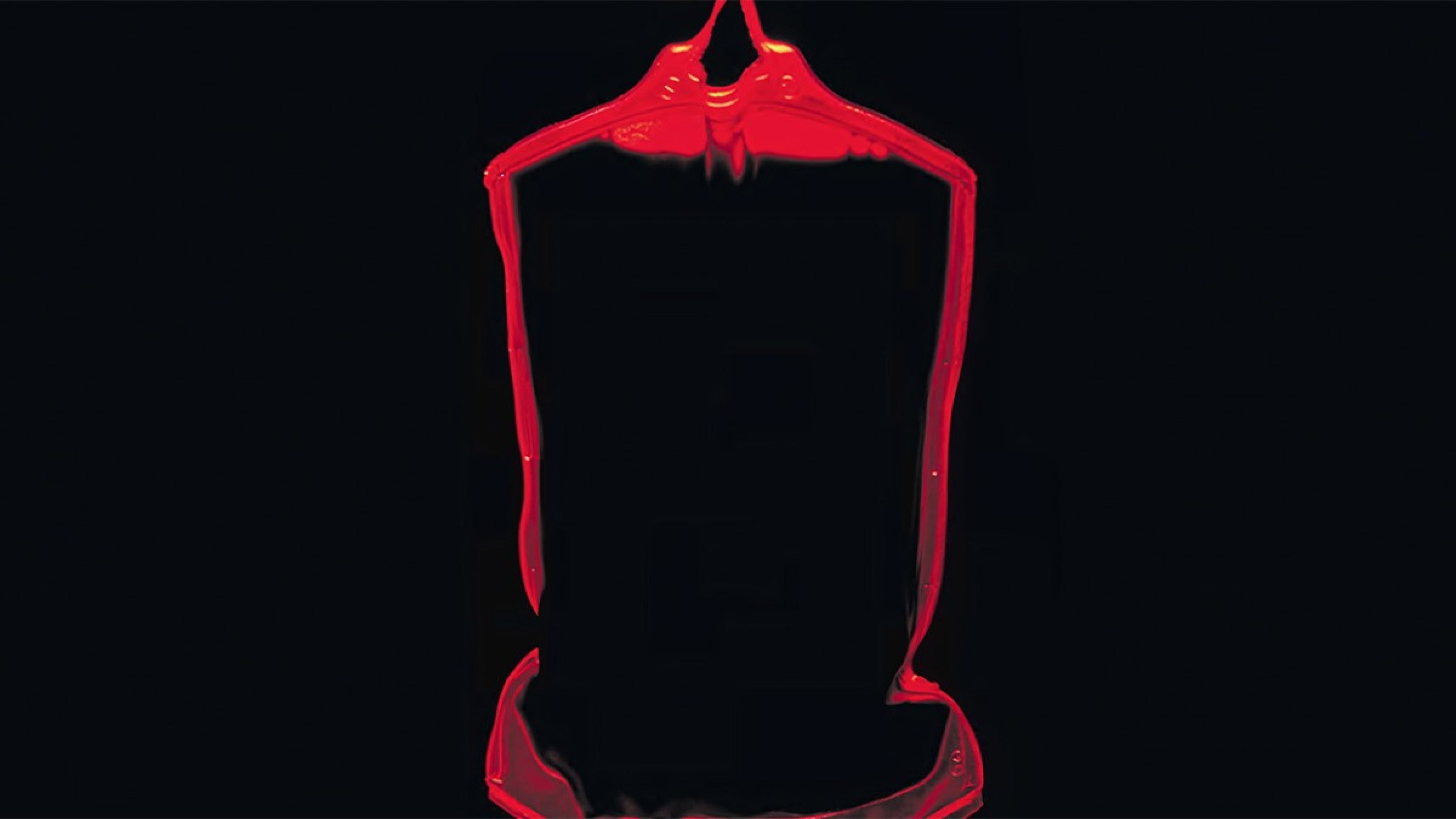 Schwarzer Hintergrund mit dem roten Umriss einer Blutkonserve